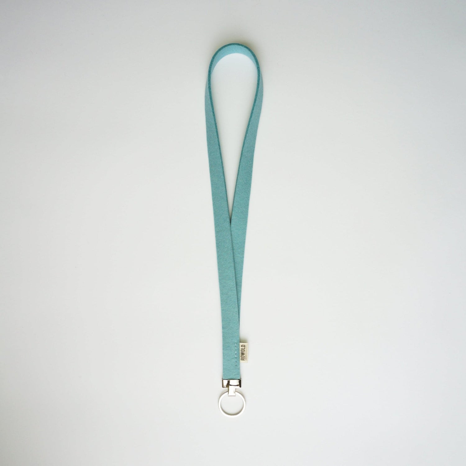 Grijs gemêleerd keycord – vilten sleutelhanger met unieke textuur, handgemaakt in Nederland